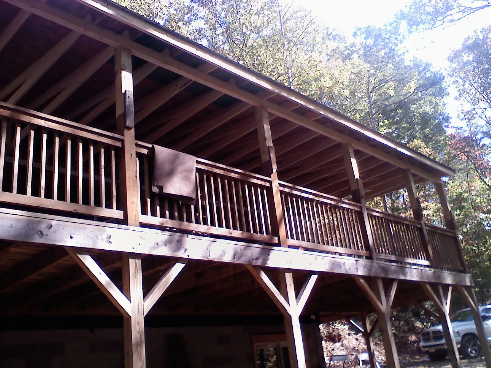 Timber framing under a new elevated porch and deck — Roof Leak Repair in Ihlen by Roofing Brothers